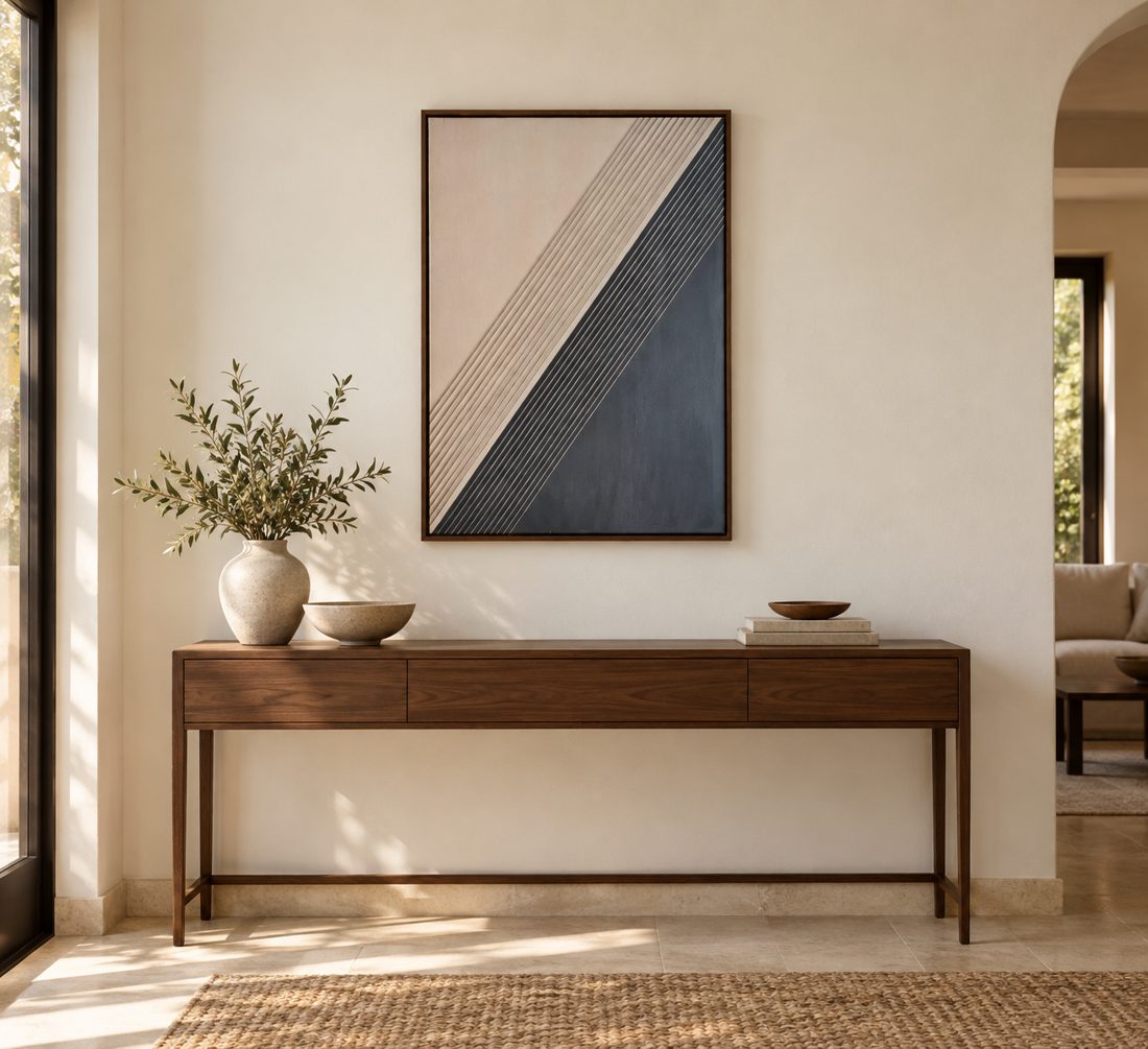 Dusk Diagonal above a walnut console in a sunlit entryway